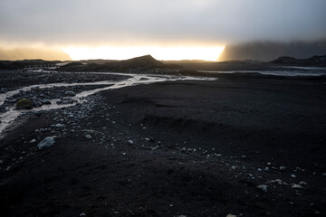 Icelandic landscape with volcanic black sand on Reynisfjara beach