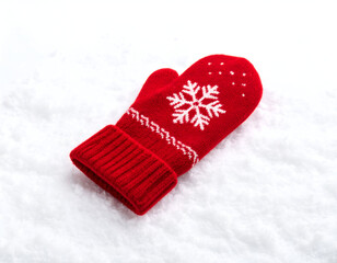 Festive Red Mitten Adorned with a Glowing Snowflake in a Winter Scene