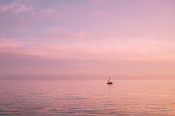 Minimal Tiny Boat on Open Sea with Sky-Dominant Frame and Ample Copy Space – ideal for posters