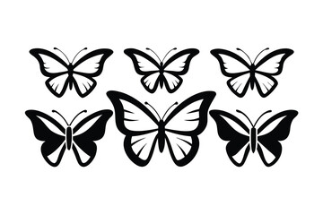 Fototapeta premium Several beautiful symmetrical butterflies are visible in striking black silhouette against a transparent background