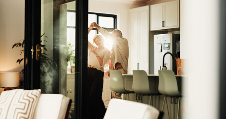 Elderly couple, love and dance in home for connection, marriage anniversary and spin. Romantic...