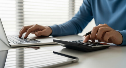 Finance report analysis tax budget financial accounting laptop calculator person hands pen office desk focused working with documents and tablet for numbers and planning