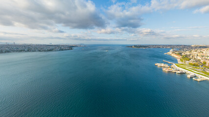 Istanbul, Turkey. Entrance to Bosphorus strait from Sea of Marmara, aerial view showing Ortakoy Mosque on European shore and Asian coast. Aerial view.