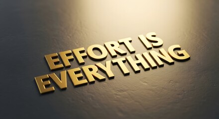 A motivational quote in bold 3D gold lettering on a textured surface emphasizing that effort is the key to success and achievement in life