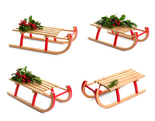 A set of vintage wooden sleds with red runners, decorated with festive holly branches and red berries, isolated on a white background