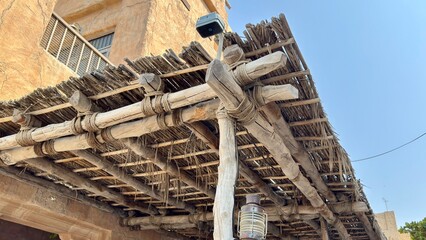 the architectural ingenuity within Dubai’s Al Fahidi Historical Neighbourhood, showcasing...