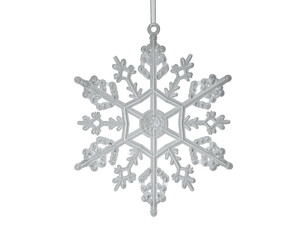 A translucent, six-pointed snowflake ornament hangs against a stark black background. It appears three-dimensional, capturing light