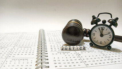 The concepts of Justice and Time are placed on the annual calendar with the word 