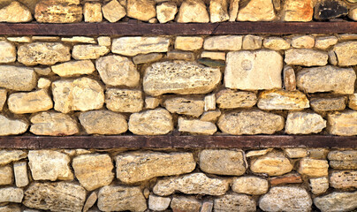 Colorful stone wall background close up view