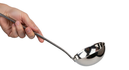 A hand holding a shiny metal ladle against a greenscreen