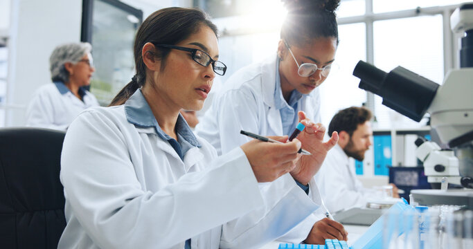 Woman, scientist and vial with blood sample for medical research, experiment or test study in lab. Female person, scientific team or DNA with forensic investigation, diagnosis or genetic analysis