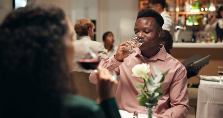 Couple, date and drinks in restaurant with wine for romance, anniversary celebration and love. Hospitality, happiness and beverage with man, woman and together with dinner for support and bonding