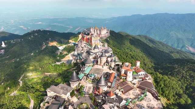 Aerial view of Ba Na Hills, cable car ride to see French Village, Debay Wine Cellar, Linh Phong Zen Monastery, Fantasy Park, Golden Bridge. Ba Na Hills is located in Da Nang, Vietnam.