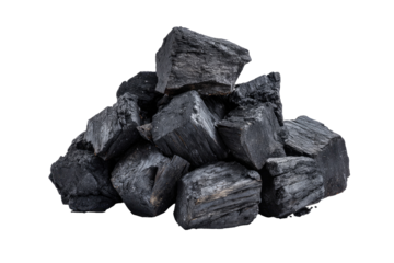 A pile of dark, rough-hewn mineral rocks isolated against a solid black background