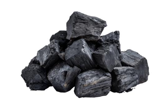 A pile of dark, rough-hewn mineral rocks isolated against a solid black background