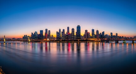 Fototapeta premium Stunning cityscape reflecting on the water at twilight, perfect for travel or business presentations, offering a serene yet dynamic urban view