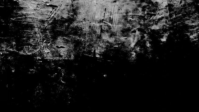 The grunge texture is monochrome with a rough surface and paint spots, fast background animation.