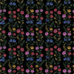 Embroidered seamless pattern on black background