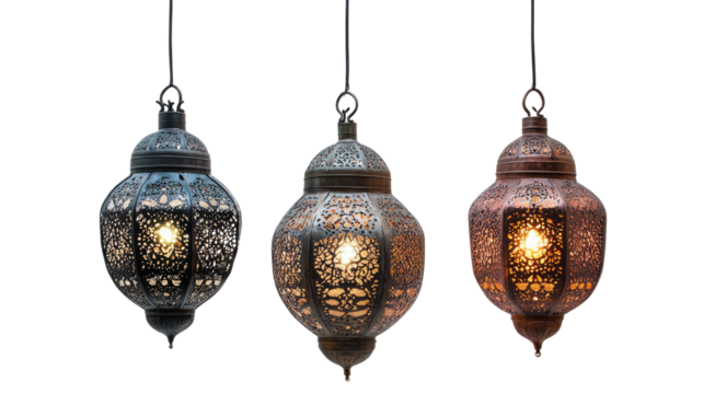 Three intricately designed hanging lanterns with metal patterns and warm glowing light showing festive decorative detail isolated on white background