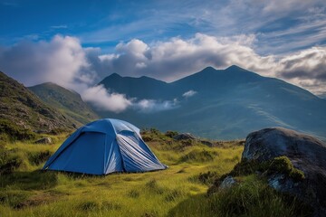 A blue tent on the grassy Aran Islands with rolling hills and distant mountains under white clouds, illustrating outdoor freedom and nature exploration for camping and adventure travel themes.