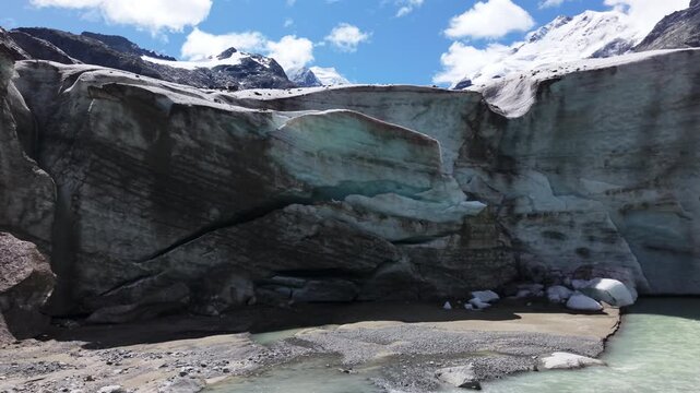 Majestic glaciers in Morteratsch, Switzerland under bright blue sky