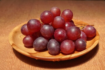 red grapes on a plate