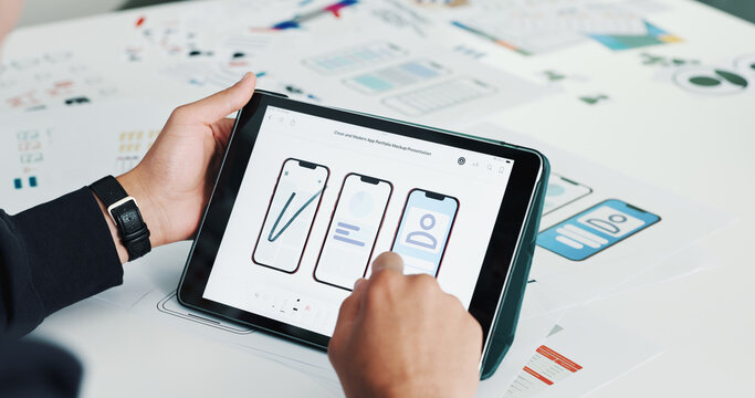 Person, hands and tablet screen with phone wireframes for app design, software development or UI. Closeup, designer or technology display with digital blueprint for mobile UX, function or layout - Powered by Adobe
