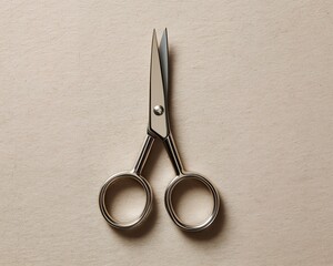 Open Stainless Scissors on Textured Beige Paper Flat Lay