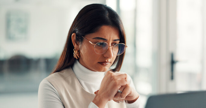 Woman, writer and stress with computer at startup, review or glasses for project management at office. Person, media consultant and proposal on pc, insight or confused with article at creative agency