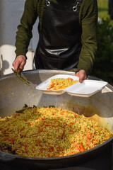 Uzbek Plov Served in Street Food Setting