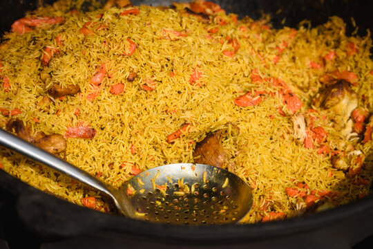 Traditional Plov - Spiced Yellow Rice with Meat, Ready to Serve - Powered by Adobe