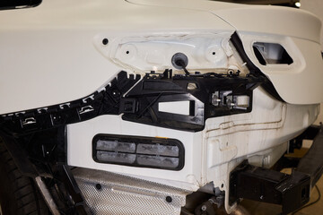 Damage assessment and parts replacement, Comprehensive assessment of vehicle front end damages including structural integrity and component.