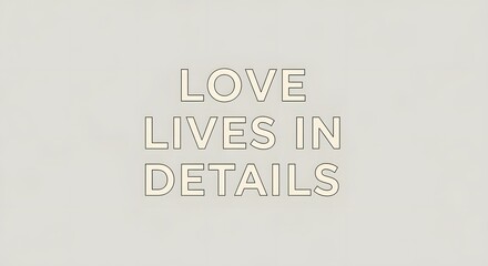 Minimalist wall art with the phrase 'LOVE LIVES IN DETAILS' in bold, three-dimensional letters on a light neutral background, emphasizing the importance of small details in life