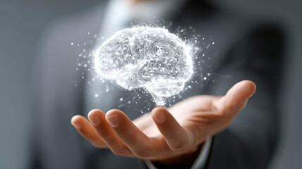 Artificial intelligence digital brain innovation technology business futurism hologram data network concept Executive holding glowing digital brain hologram palm, symbolizing artificial