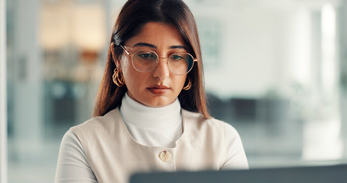 Woman, writer and thinking with computer, startup or glasses for project management review at office. Person, media consultant and editor with pc, insight and decision for article at creative agency