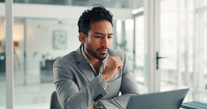 Office, employee and man with laptop, think and financial analysis on website, reading and research. Investment banker, person and planning for pitch with technology, online and checking market