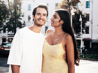 Smiling beautiful woman and her handsome boyfriend. Happy cheerful family. Sexy couple posing in...