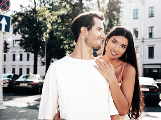 Smiling beautiful woman and her handsome boyfriend. Happy cheerful family. Sexy couple posing in...