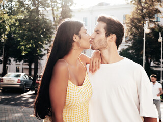 Smiling beautiful woman and her handsome boyfriend. Happy cheerful family. Sexy couple posing in...