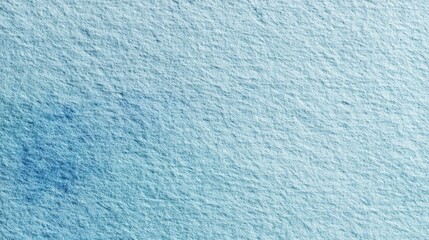 Soft blue watercolor paper texture background with subtle gradients and visible fibers