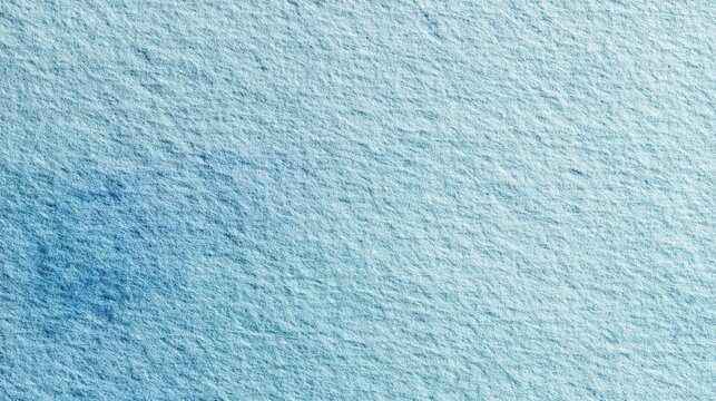 Soft blue watercolor paper texture background with subtle gradients and visible fibers