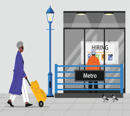 Illustration of an elderly woman with a suitcase walks past a metro station with a hiring sign, pigeons, and a blue light post, showcasing urban life and job opportunitiesIllustration of an elderly wo