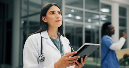 Tablet, doctor thinking and woman in hospital for healthcare, report or idea in clinic at night. Technology, medical worker and person planning, problem solving or decision for schedule on overtime