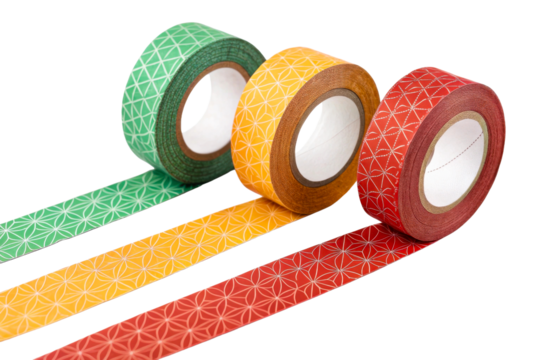 Three rolls of decorative tape in green, yellow, and red