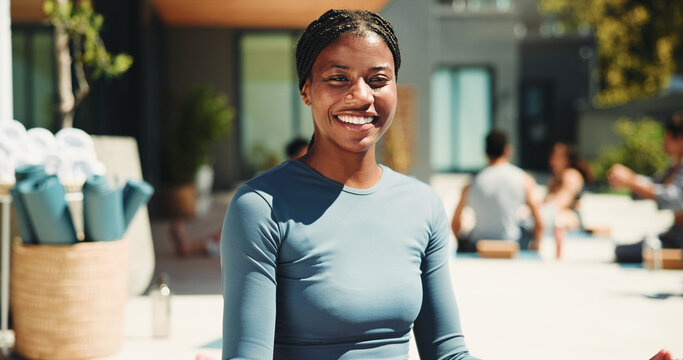 Portrait, instructor and happy woman with outdoor yoga class at resort, health and body wellness practice. Join us, pilates session and trainer with smile for fitness, holistic exercise and retreat