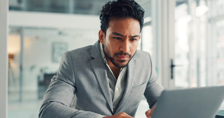 Reading, online and businessman with laptop, office and financial analysis on web, info and research. Investment banker, person and planning for pitch with tech, review and checking market data