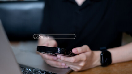 Person using smartphone typing online searching for information browsing website internet network connection digital cyberspace mobile query search business app explore media input content discovery