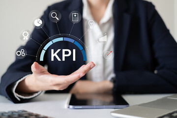 Businessman working on KPIs key performance indicator review corporate business report end year annual evaluation data analysis marketing strategy technology information client statistic measure trend