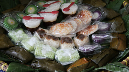 Jajan pasar (market snacks) in Java, consisting of assorted kue. Jajan Pasar is Indonesian traditional sweet and savory snacks usually sold in traditional market, street and village