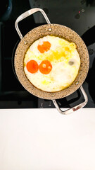 Fried Eggs with Melted Cheese